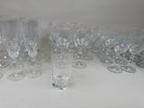 a lot of empty wine glasses sitting on a table