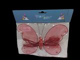 a pink butterfly in a plastic bag on a black background