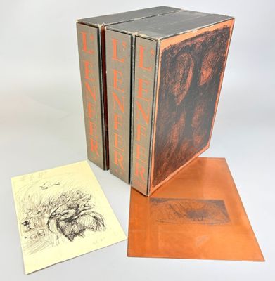 three books are stacked on top of each other on a table