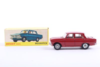 an image of a red toy car next to a box of matches