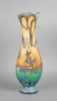 a glass vase that is sitting on a table