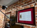 a picture of a brick wall with a picture on it