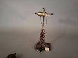a lamp that is sitting on a table with a cat
