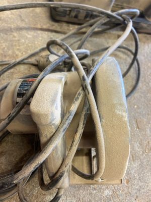 a bunch of wires that are tangled up on the floor