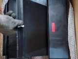 a box that has a laptop inside of it