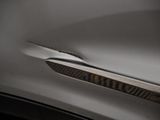 a close up of a car door handle with a hole in it
