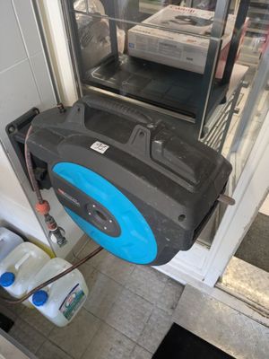 Dérouleur de tuyau d'arrosage - Photo 1