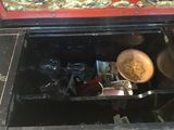an open box with a plate of food inside of it