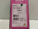 a close up of a pink box on a white surface