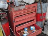 an image of a garage with a red tool chest