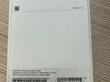 the back of a white box with a black and white sticker on it