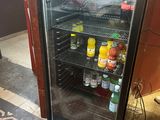 a refrigerator that has a lot of drinks inside of it