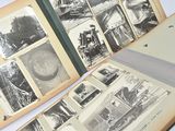 an open book with pictures of a train on it