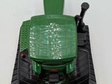 a toy tractor that is sitting on top of a table