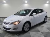 a picture of a white car parked in a garage
