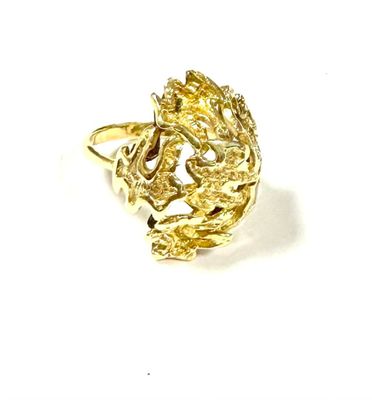an image of a gold ring with a dragon on it