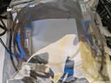 a bag of wires and cords sitting on a table
