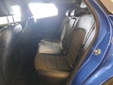 a picture of a blue car with black leather seats