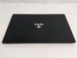 a black laptop on a white surface with a logo on it