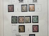 un vieux livre sur lequel sont collés tout un tas de timbres différents