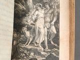 an old book with a picture of a man and a dog on it