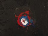 a painting of a red, white and blue circle on a black background