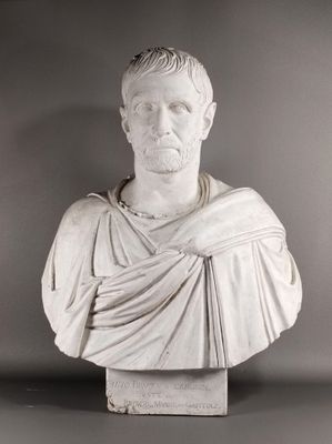 marble bust of a man with a draped cloth around his neck
