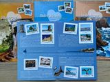 four different booklets with pictures of the sea and the beach