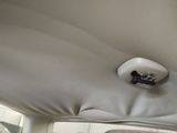 a picture of the inside of a car with the sunroof