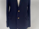 navy blue blazer jacket on a mannequin dummy