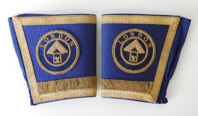pair of blue and gold masonic stoles with gold fringes