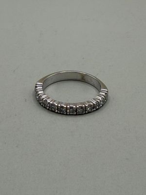 an image of a diamond ring on a table