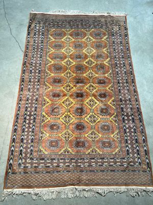 a rug with a pattern on it is laying on the floor