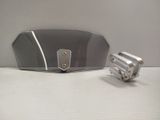 a silver toaster and a toaster on a table