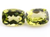 a pair of two green and yellow quartz gems