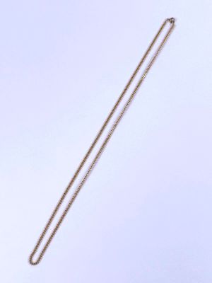 a long chain that is laying on the ground