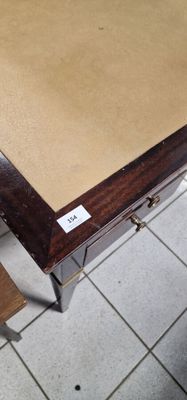 a wooden table with a drawer underneath it on a tile floor