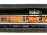 a toy train that is in a box on the table