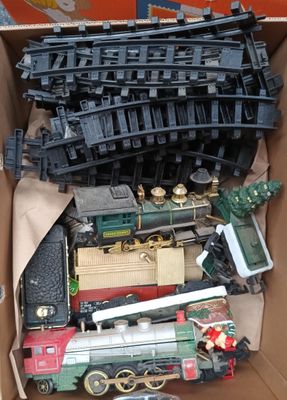 a box full of toy trains sitting on a table