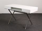 an image of a white desk with a drawer on top of it