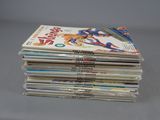 a stack of comics sitting on top of each other