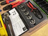 many different types of pliers in a box