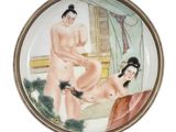 a picture of a picture of two women in a bathtub