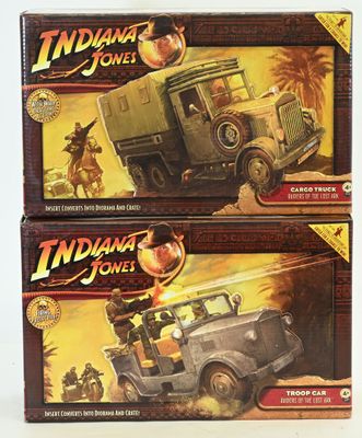 two boxes of indiana jones board games sitting on a table