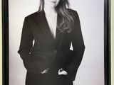 black and white photograph of a woman in a suit posing for a picture
