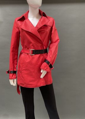 an image of a mannequin dressed in a red coat and black leggings