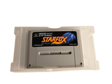 a nintendo game that is sitting on a white surface