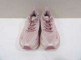 pink nike air max sneakers on a white surface