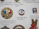 a lot of badges on a piece of paper