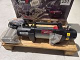 an image of a winch sitting on a pallet with a box in the background